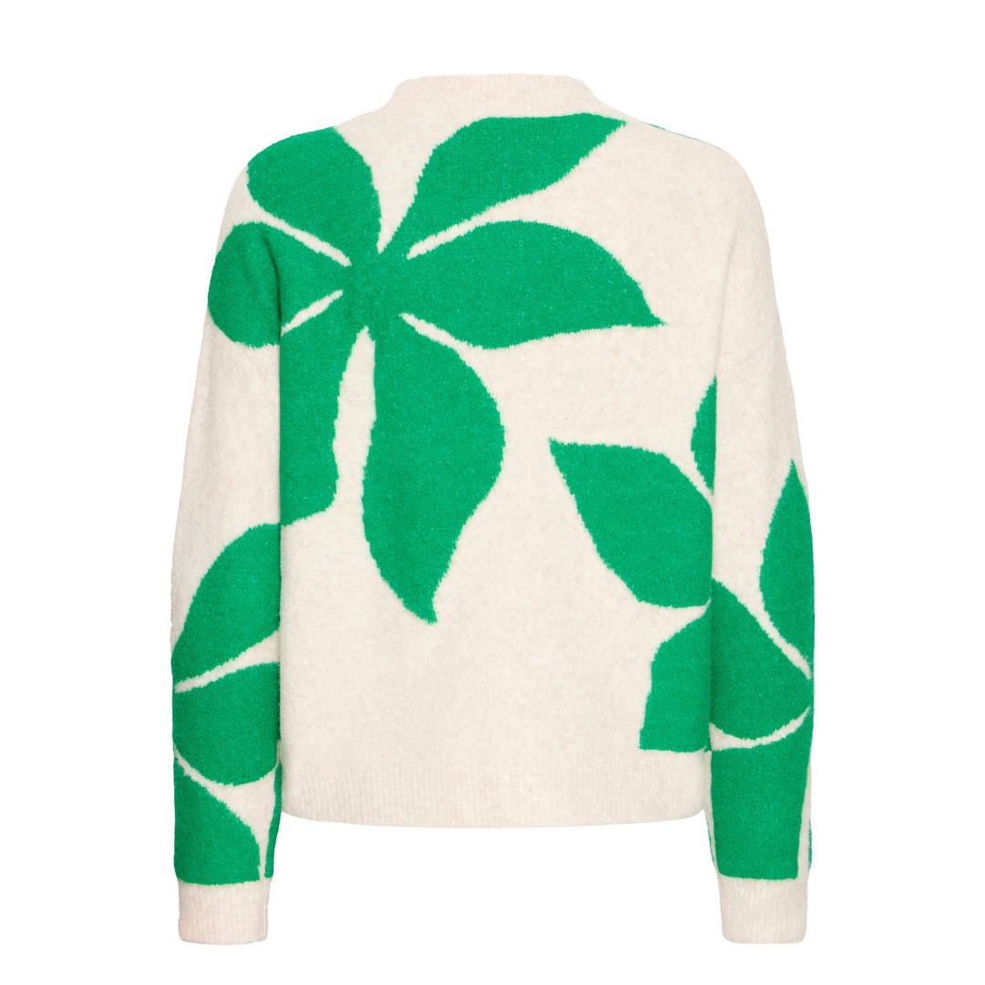 Back view of cream sweater with green leaf patterns on a white background