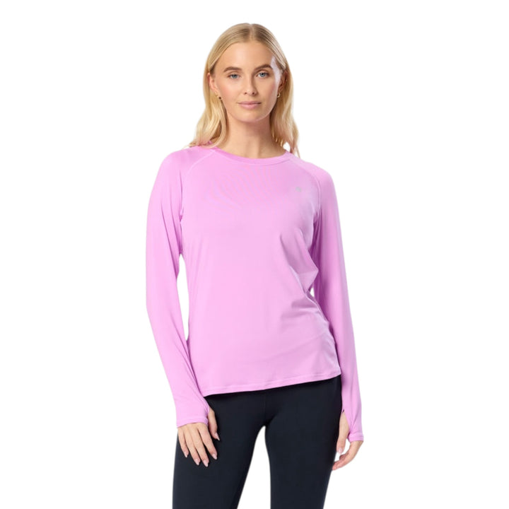 Woman wearing a pink long-sleeve shirt on a white background