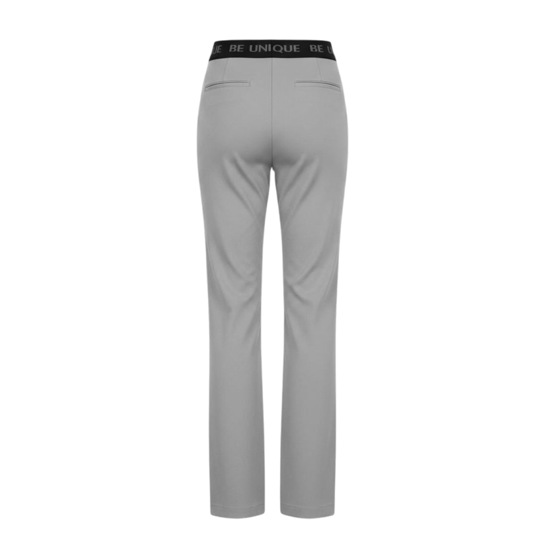 Gray pants with a black waistband on a white background