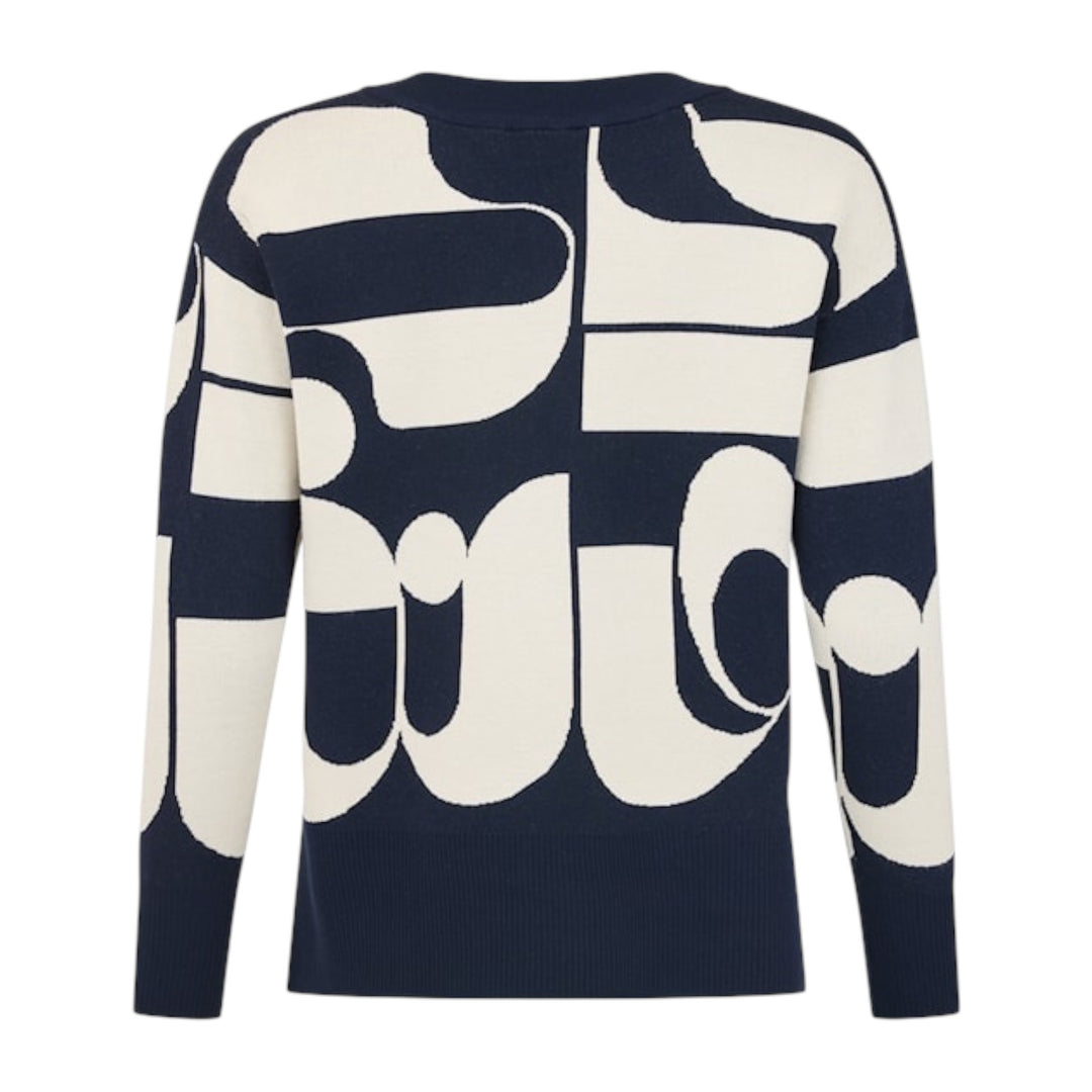 Navy sweater with abstract white pattern on a white background
