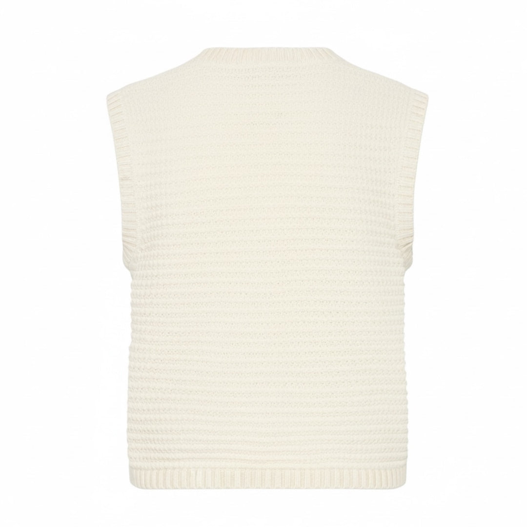 White knitted vest on a white background