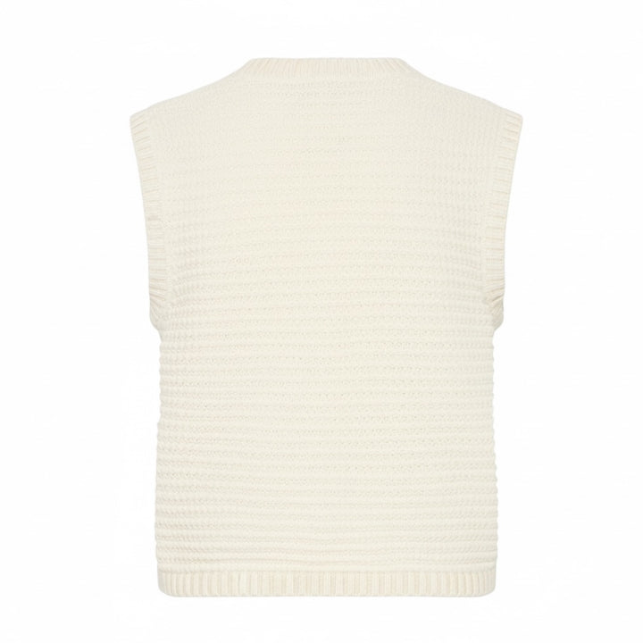 White knitted vest on a white background