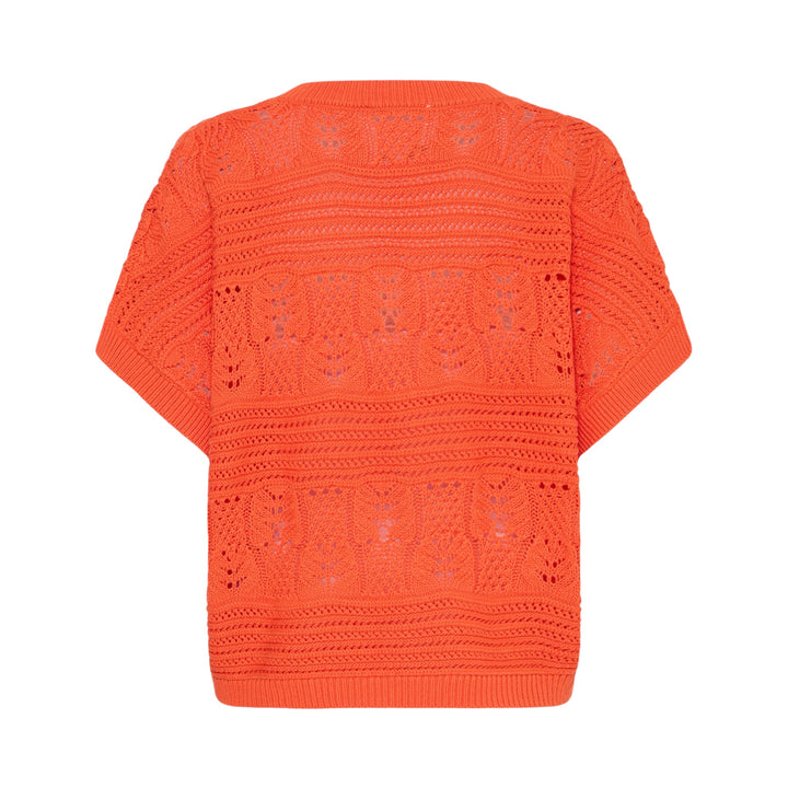 Orange crochet top on a white background