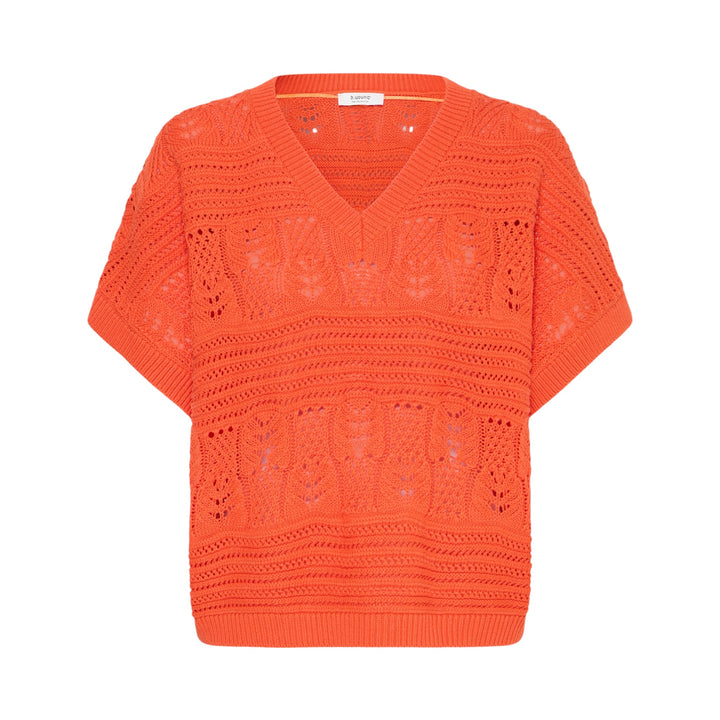 Orange crochet sweater on a white background