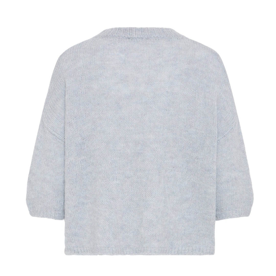 Light gray sweater on a white background