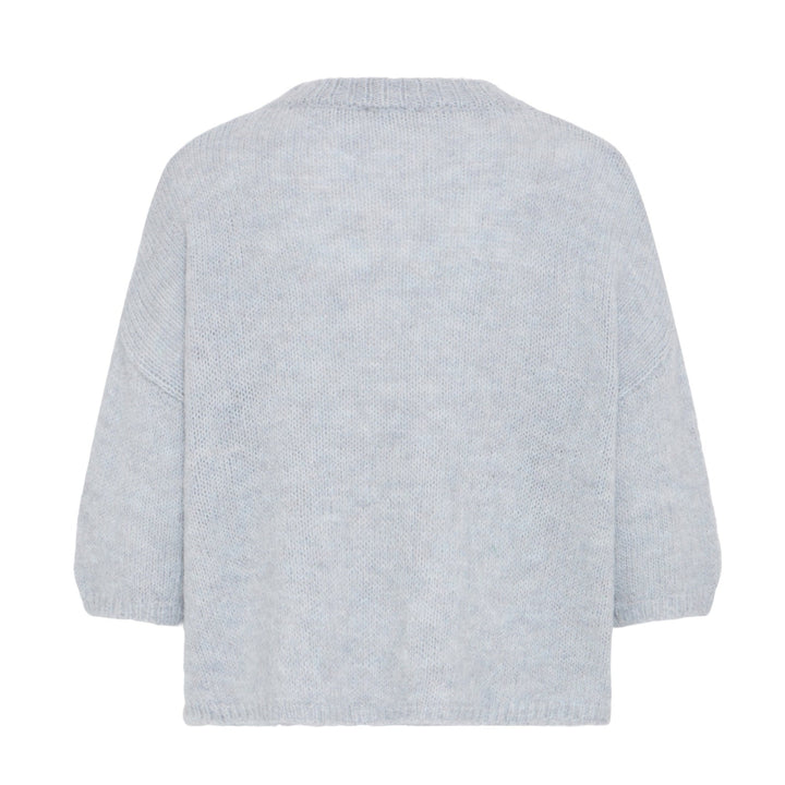 Light gray sweater on a white background
