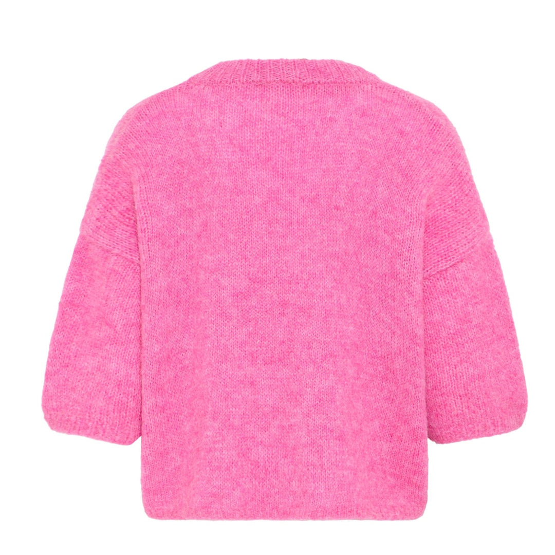 Pink sweater on a white background