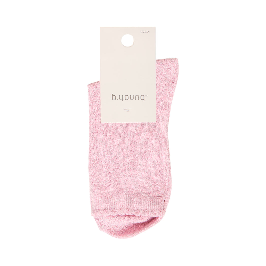 Pink sock with a visible brand label on a white background