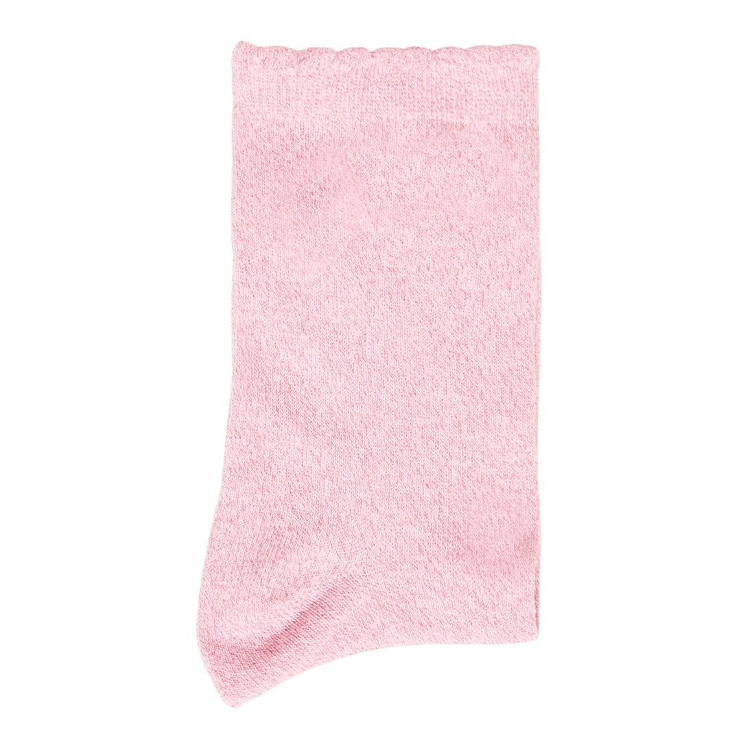 Pink textured blanket on a white background