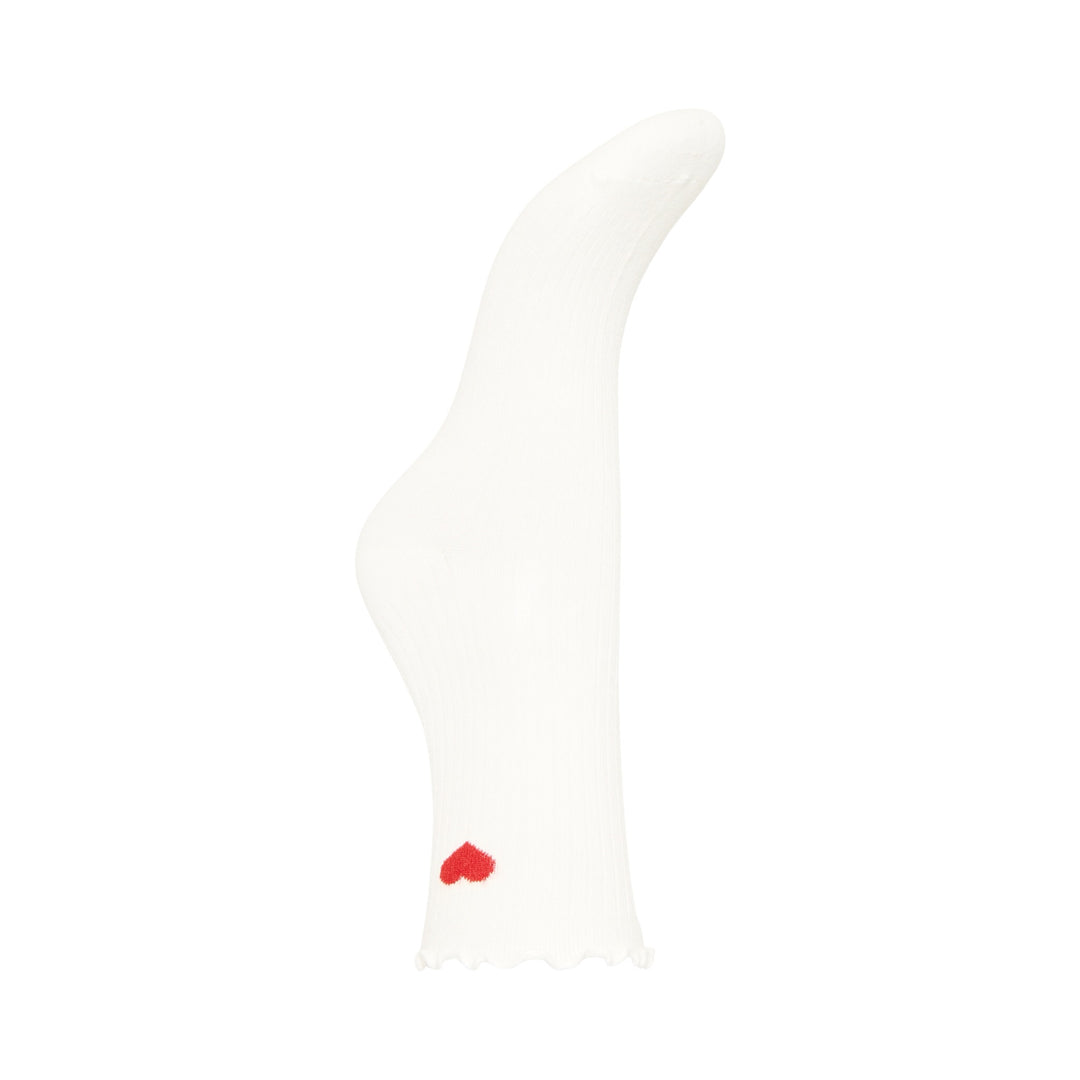 White sock with a red heart detail on a white background