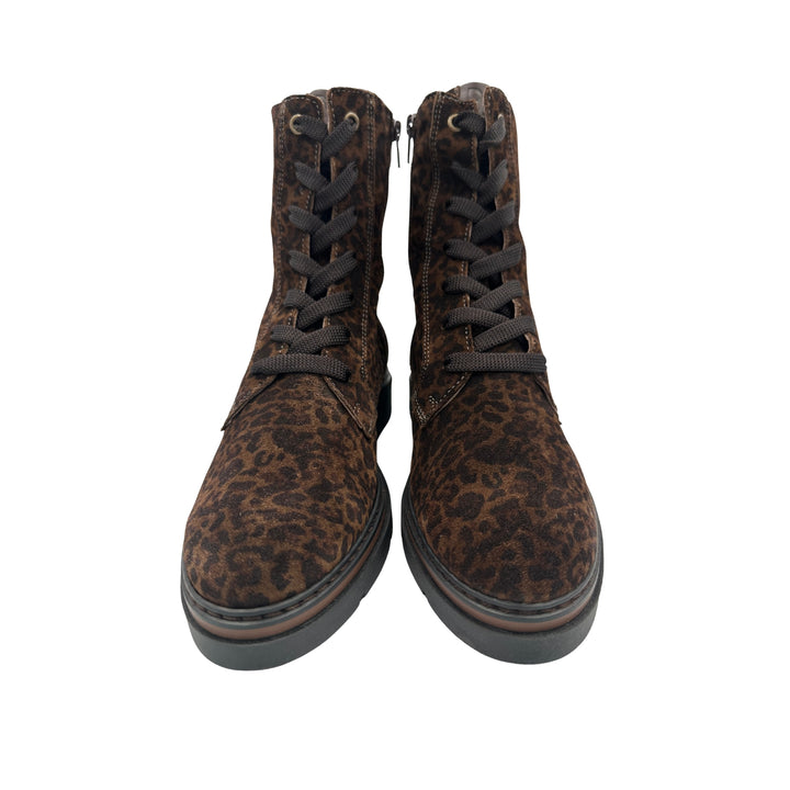 A pair of lace-up ankle boots with a brown and black leopard print pattern, black laces, and side zippers, shown against a plain white background.