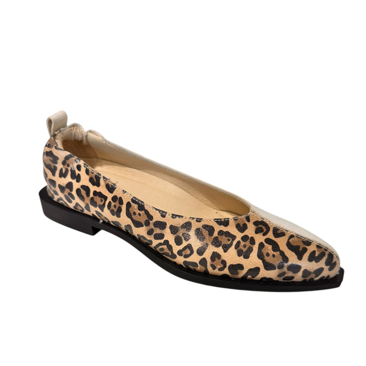 Leopard print flat shoe on a white background