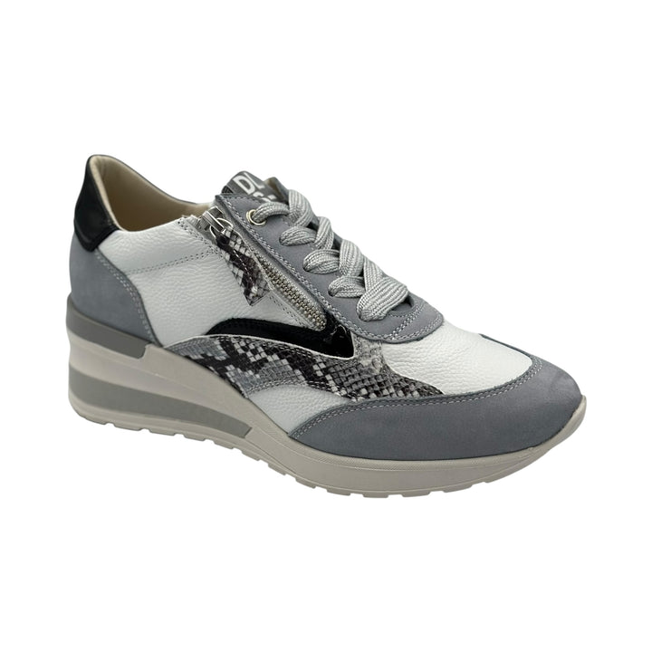 Light blue and white sneaker with patterned accents on a white background