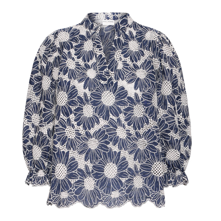 Navy floral blouse on a white background