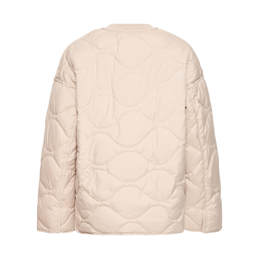 Beige quilted jacket on a white background