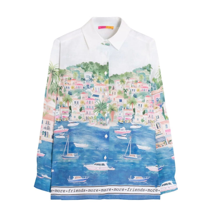 White shirt with a colorful coastal scene print on a white background