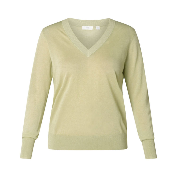 Light green sweater on a white background